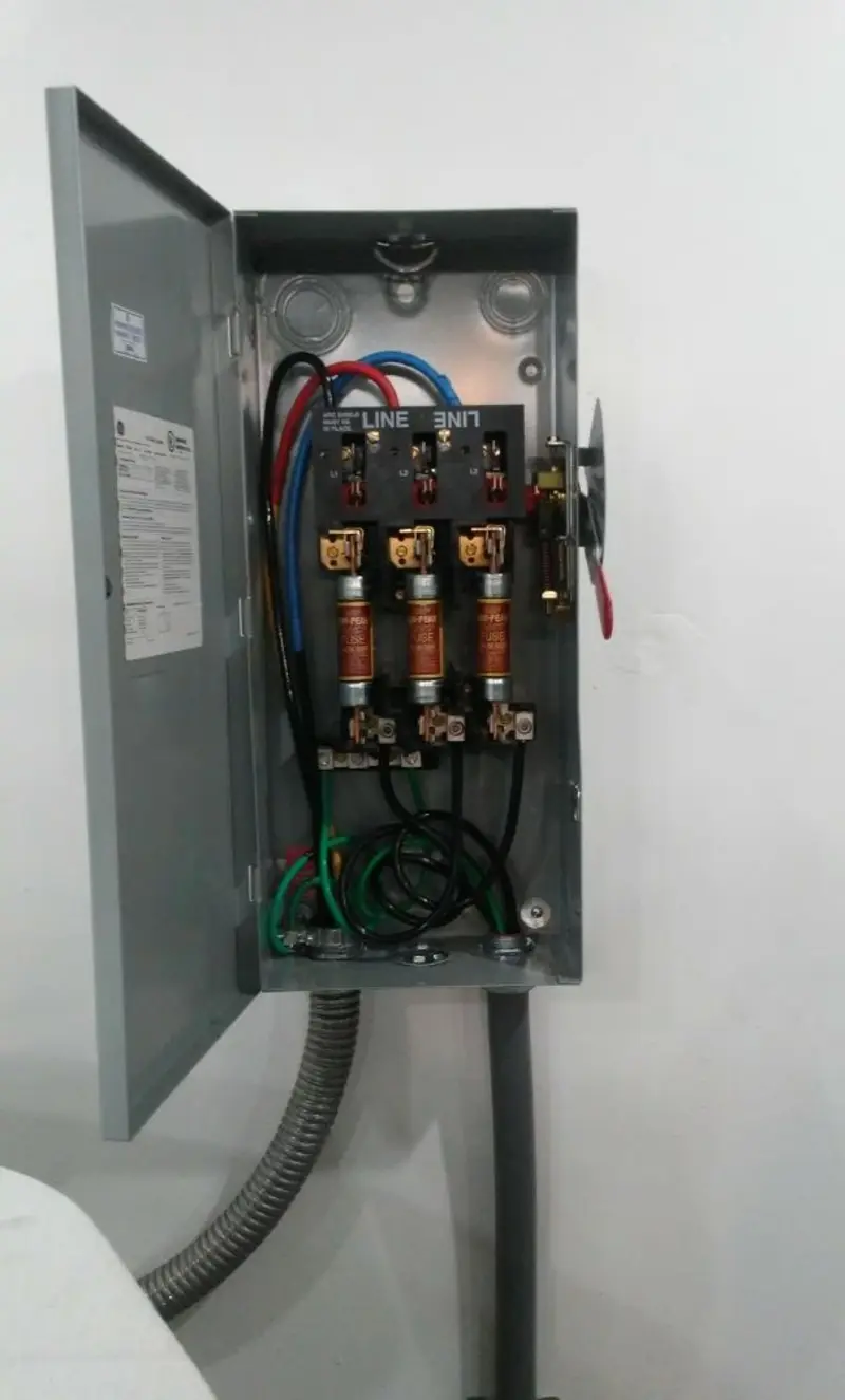 Three-phase disconnect switch installed for Smoke Detector Installation in Three Lakes