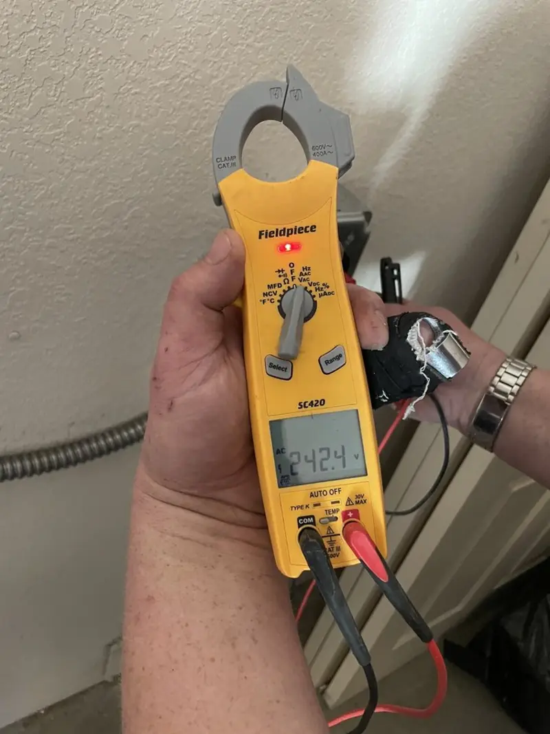 Voltage testing with clamp meter during Aluminum Wiring Replacement in Three Lakes